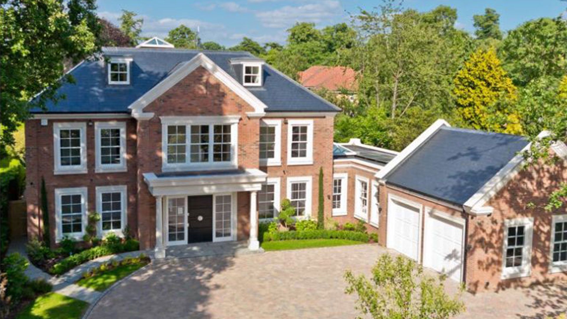 Large detached brick new build house with a double garage